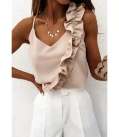 Beige röyhelökoristeinen toppi