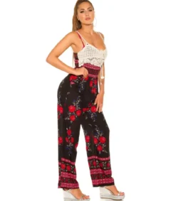 Musta ruusukuvioinen jumpsuit virkkauksella