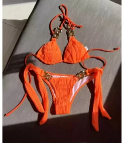 Oranssit ketjukoristeiset narubikinit