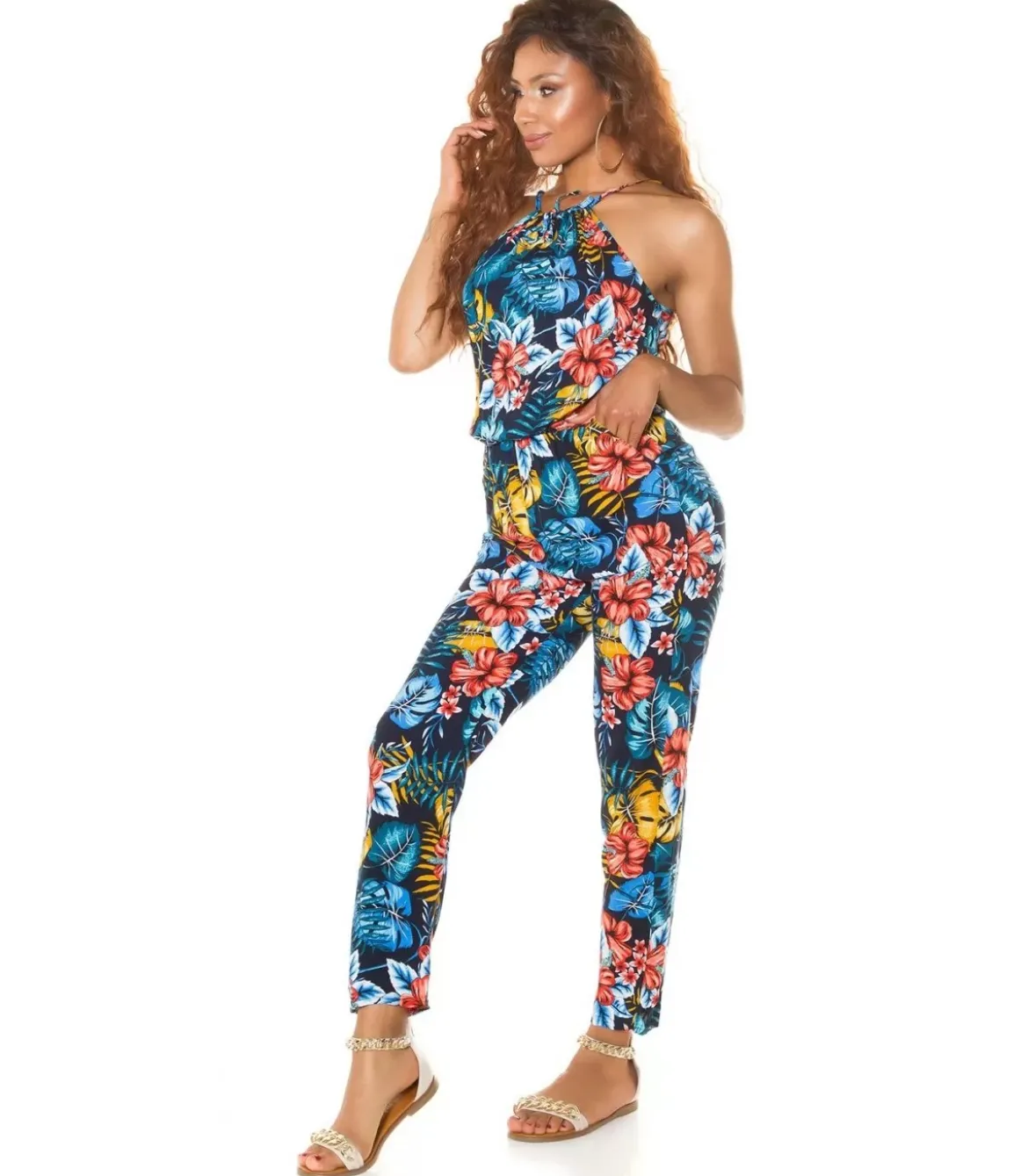 Sininen kukka- ja lehtikuvioinen jumpsuit